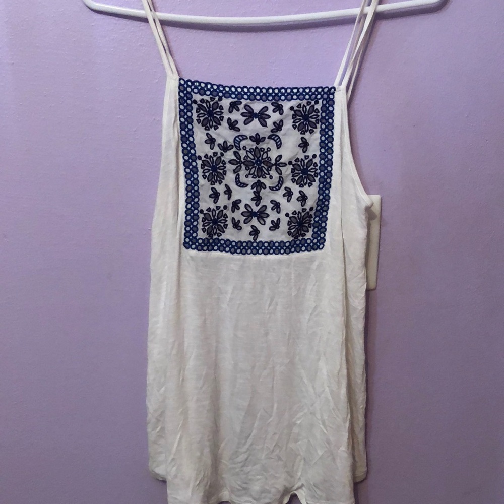 A blue and white tank top